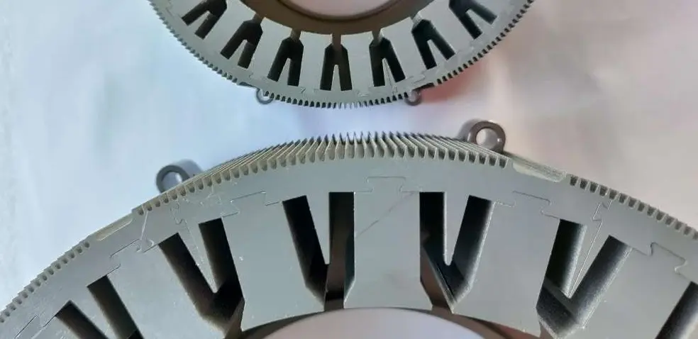 Grain oriented steel stator